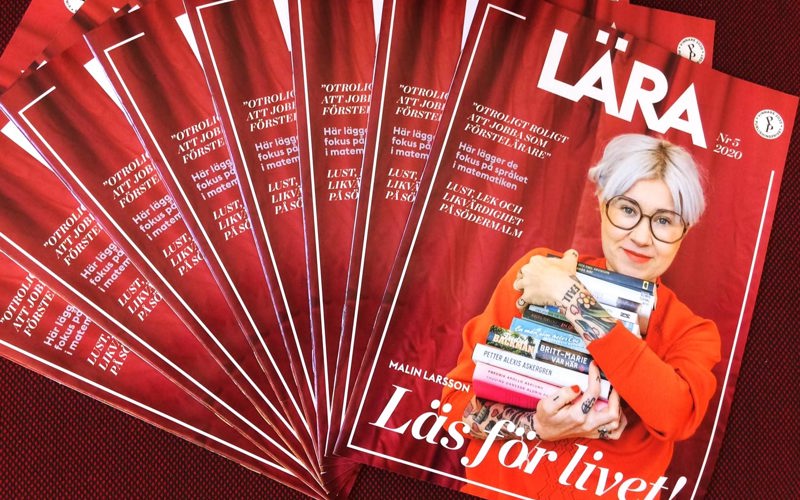 Flera nummer av tidningen ligger utspridda i en solfjäderform.